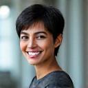 Profile picture of Maya, a tech influencer, smiling.